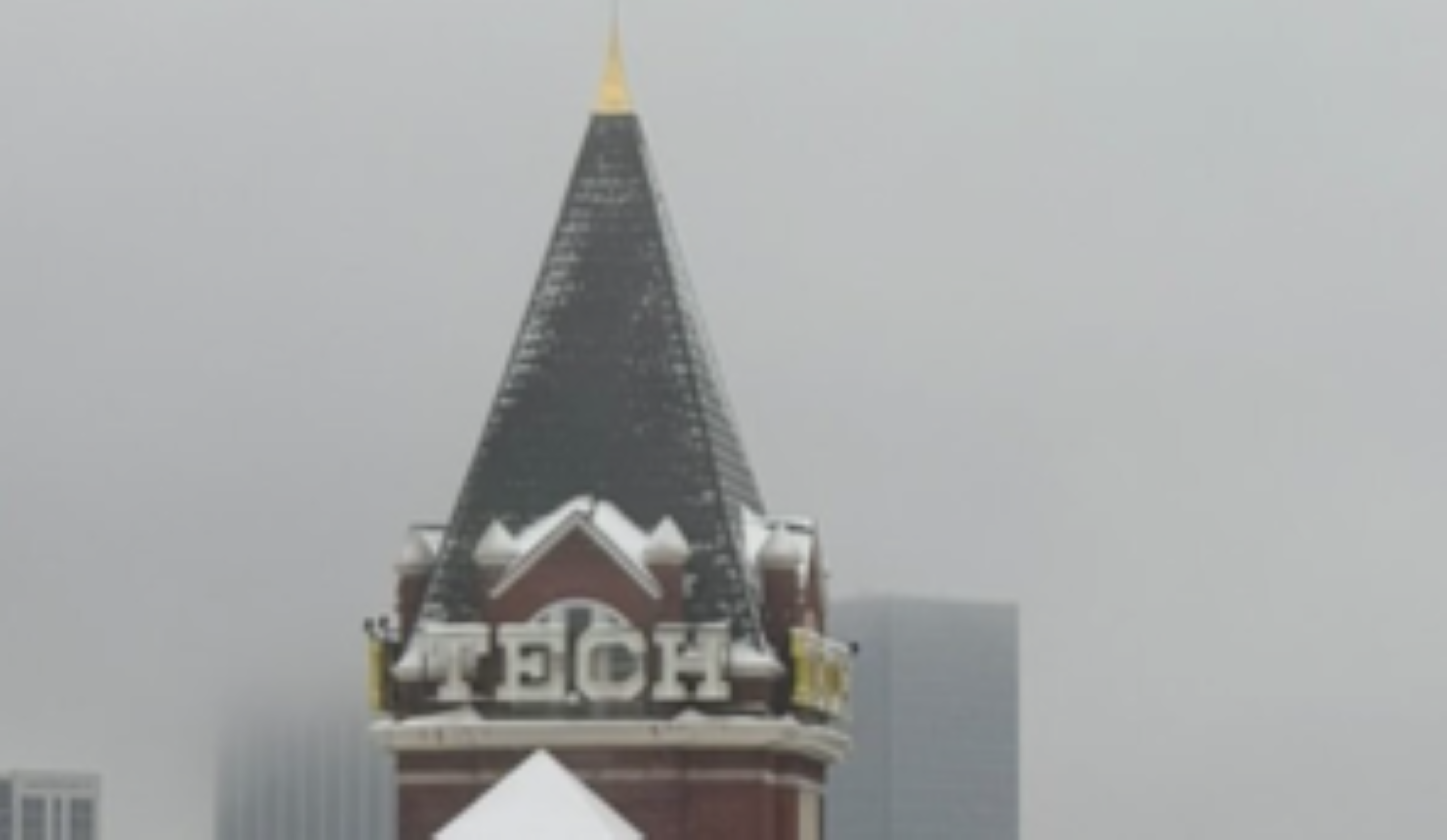 image of snow covered tech tower