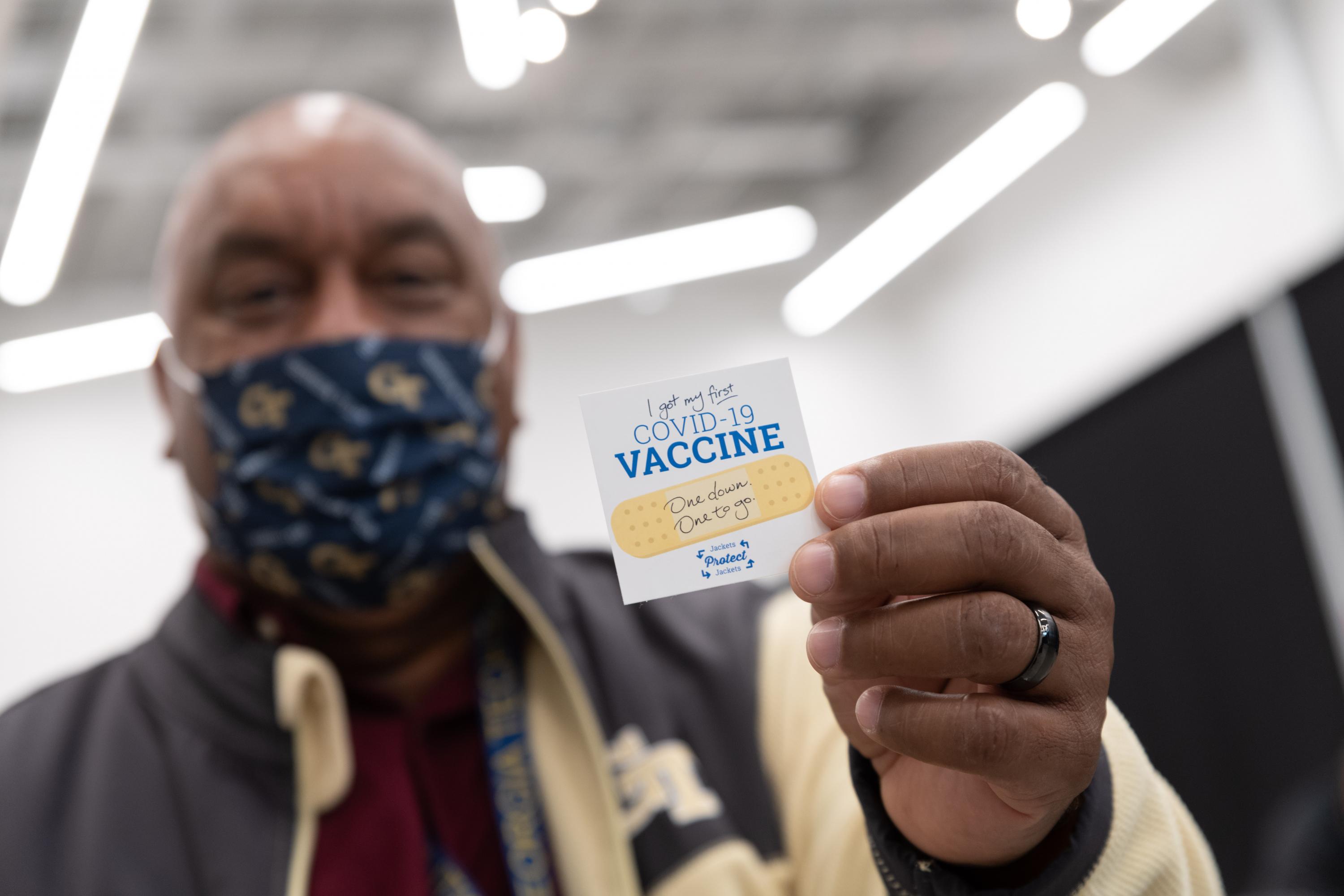 Photo of Marlon Ellis, area maintenance manager for KBISD, receives his first dose of the Covid-19 vaccine.