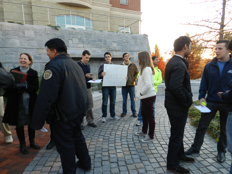 Students and administrators converse prior to setting off for the 2012 Campus Safety Walk, organized by the Student Government Association.