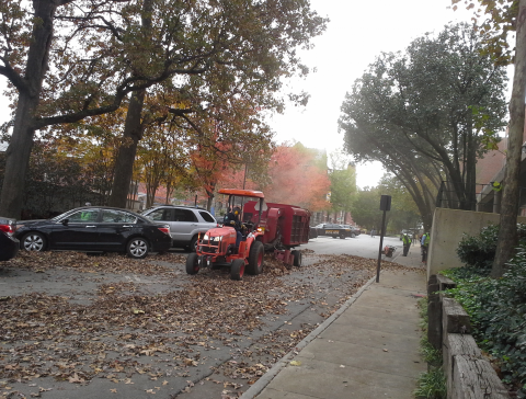 Landscape Workers Using Leaf-Vac